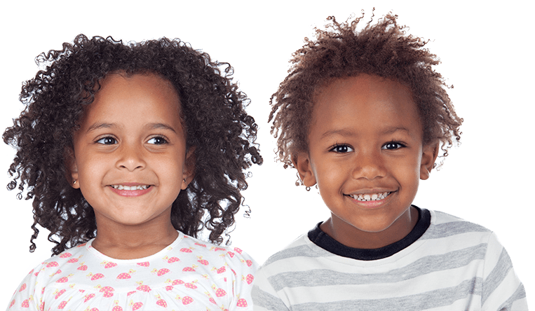 Two children smiling
